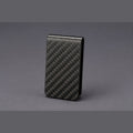 Carbon Fiber Money Clip, matte black, on graphite